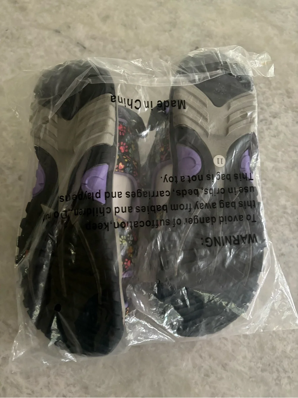 Skechers Black Sandals with Purple and Multicolor Paw Prints
